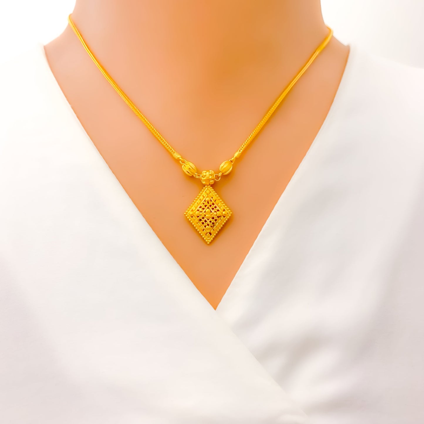 Reflective Diamond Shaped Gold Set