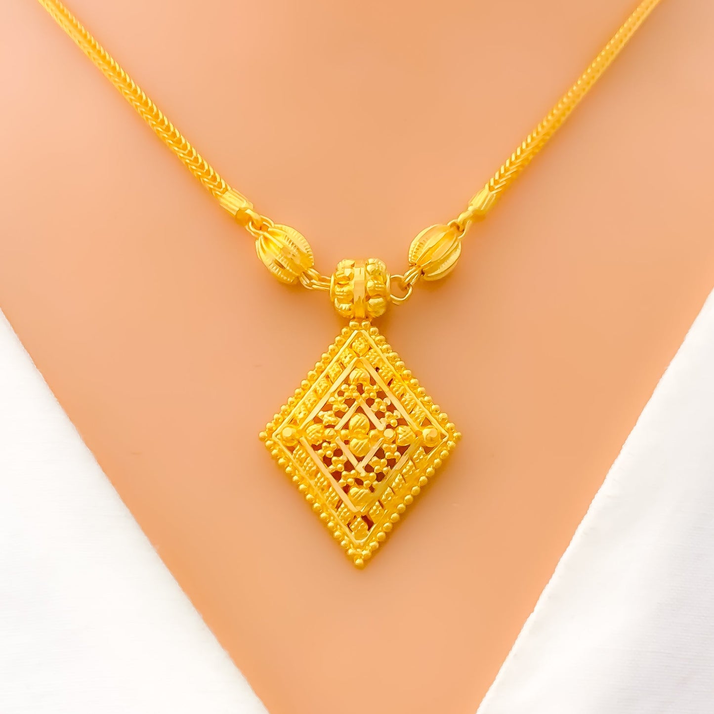 Reflective Diamond Shaped Gold Set