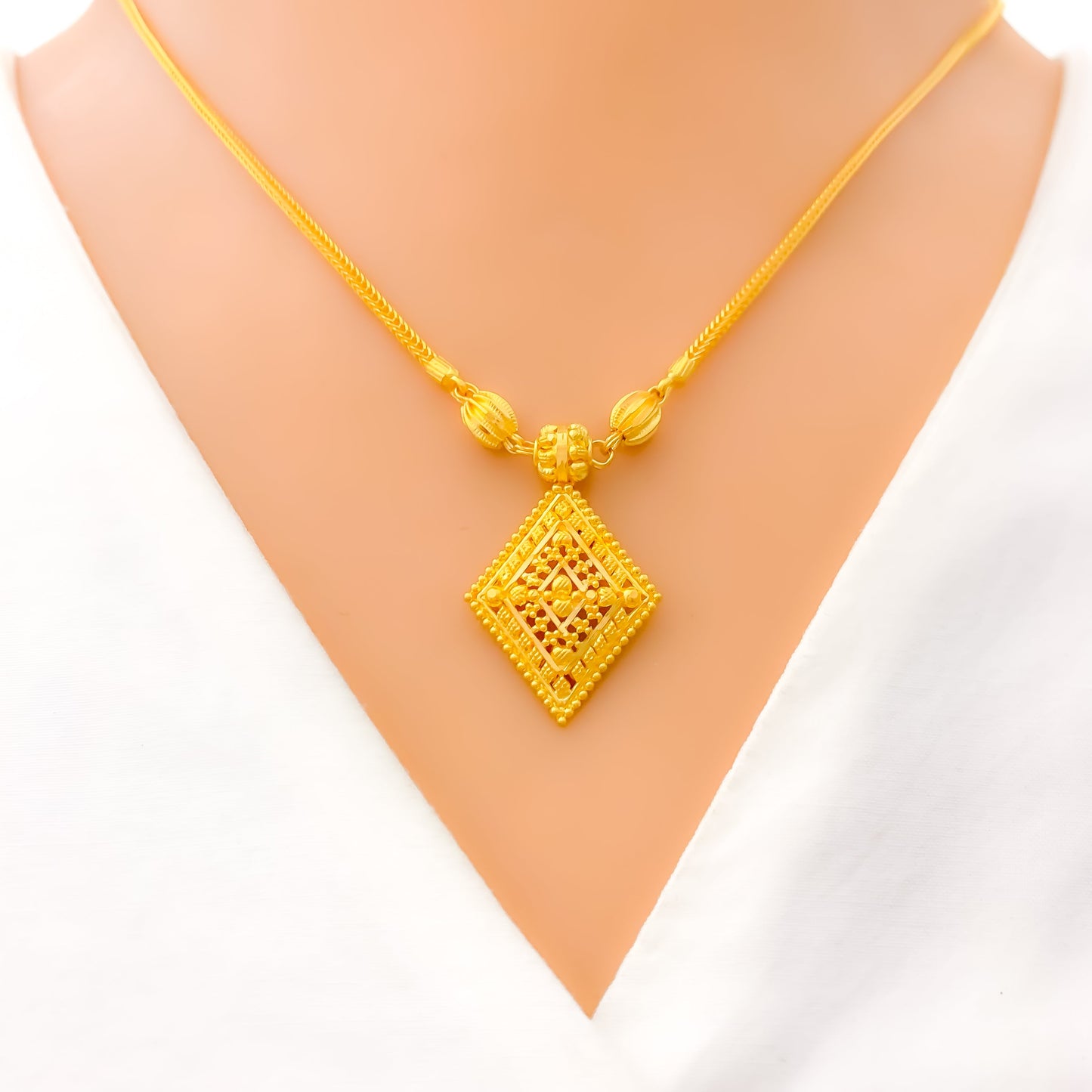 Reflective Diamond Shaped Gold Set