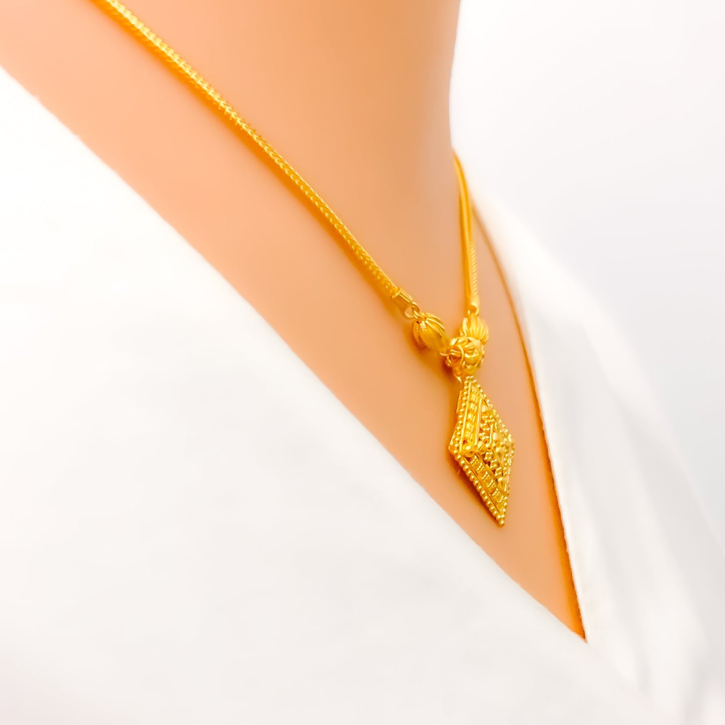 Reflective Diamond Shaped Gold Set